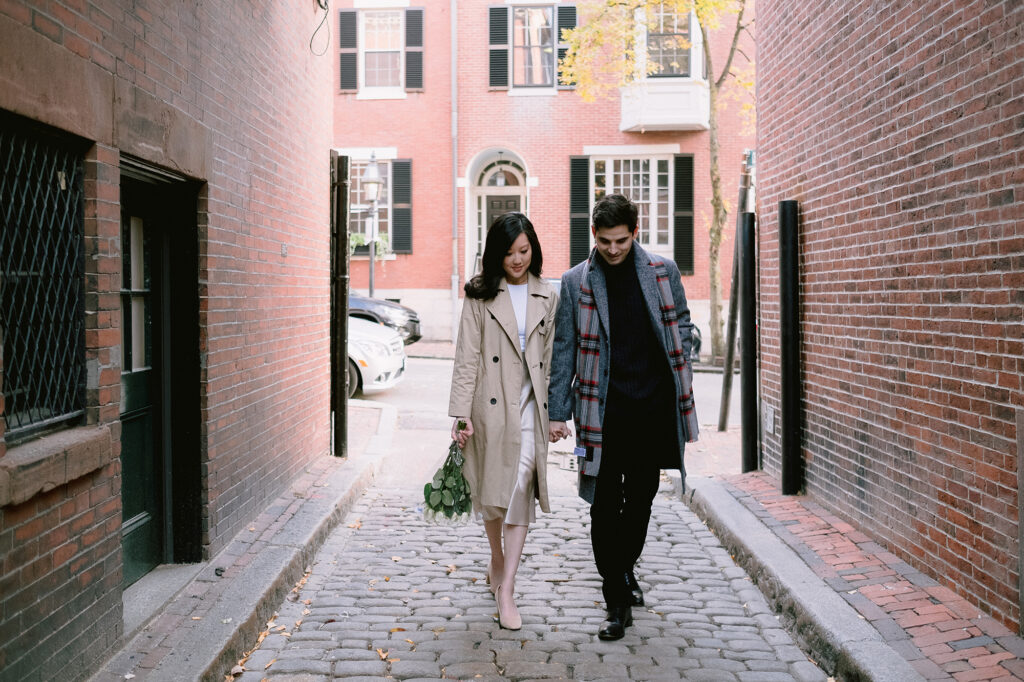 Back Bay session with a stylish couple who are looking great in their engagement photos